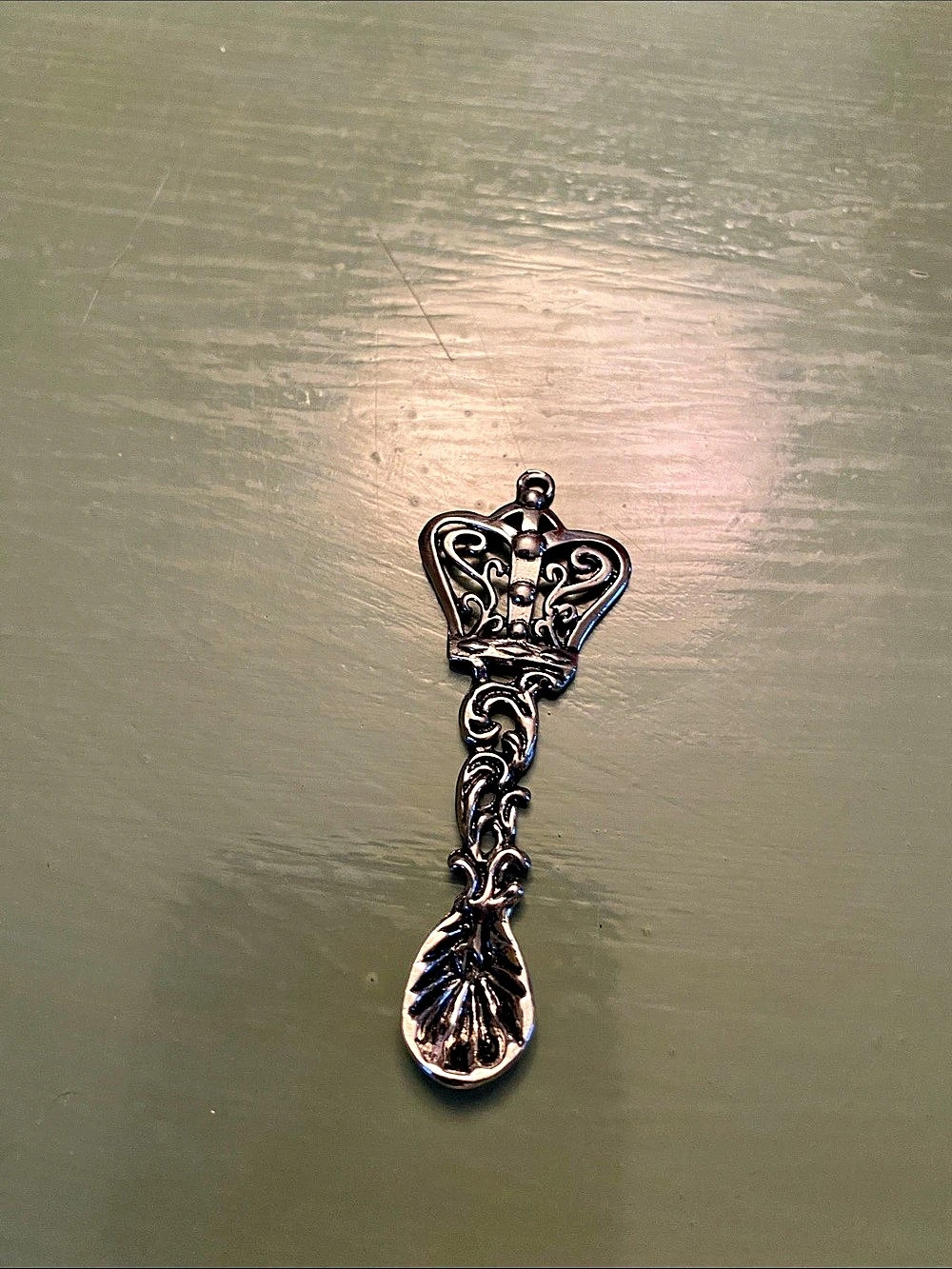 Ornate Silver-Tone Spoon-Shaped Brooch
